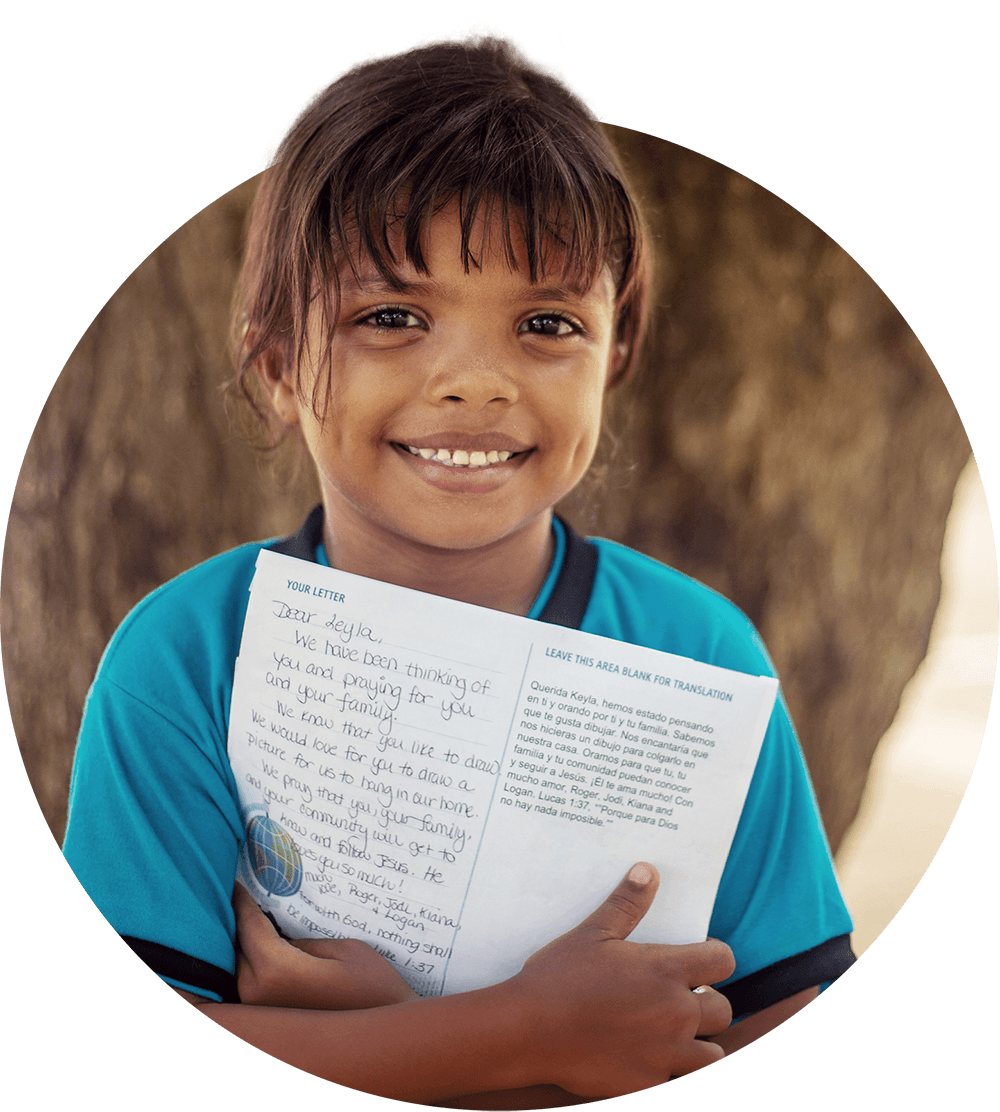 Supported child with letter